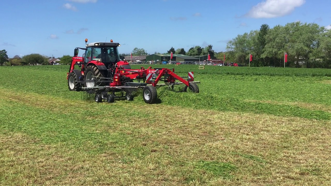 Rake at Work on the Farm with Massey Ferguson