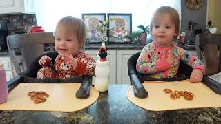 Twins try chocolate covered pretzels