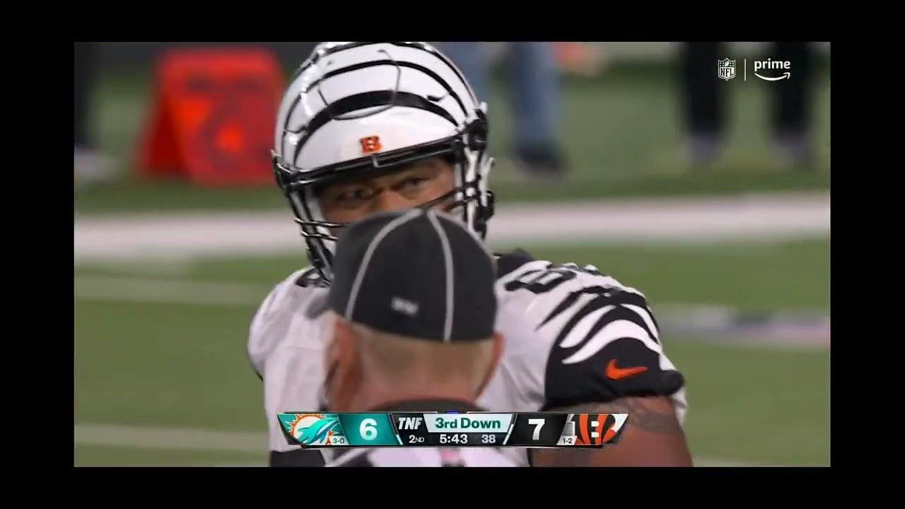 Miami quarterback has a concussion again. he's throwing up gang signs. not good. YouTube