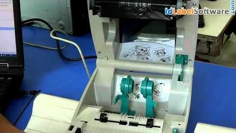 How to insert roll in Zebra printer