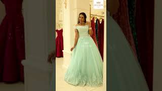 An elegant, netted ball gown in a soft shade of turquoise could never go wrong. screenshot 5