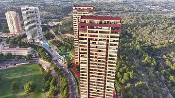 aerial view of development area, overhead drone footage showcasing building and landscape features