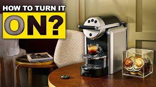 Quick Tutorial: How to Turn On the Gray Nespresso Zenius Coffee Machine.