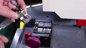 Cómo usar la máquina cortadora de llaves SEC E9 para cortar llaves HU64 Mercedes Benz