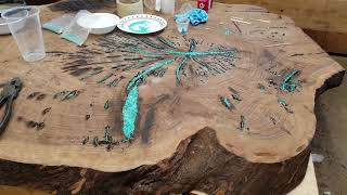 Claro walnut slab with materials Earl will use for turquoise inlay.