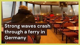 Strong waves crash through a ferry in #Hamburg #Germany