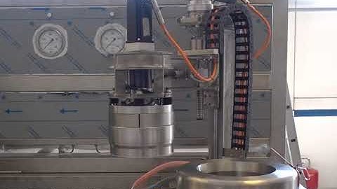 HIGHTECH Extracts: SCFN Supercritical CO2 Extractor -  Robotic Lid Removal Feature