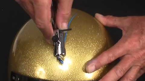 Demonstration of Beugler Pinstriper, pinstriping a helmet using tape as a guide