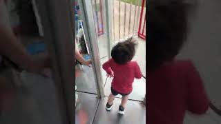 Boy walks into wall in glass maze