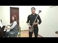 Plays on the Qashqar rubab Shohruh Abdullayev and Alfiya Abdullayeva (piano)