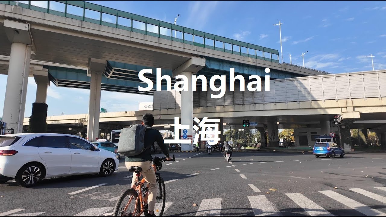 Shanghai, चीन | Huaihai Road Cycling Hongqiao Railway स्टेशन | POV राइड 4K