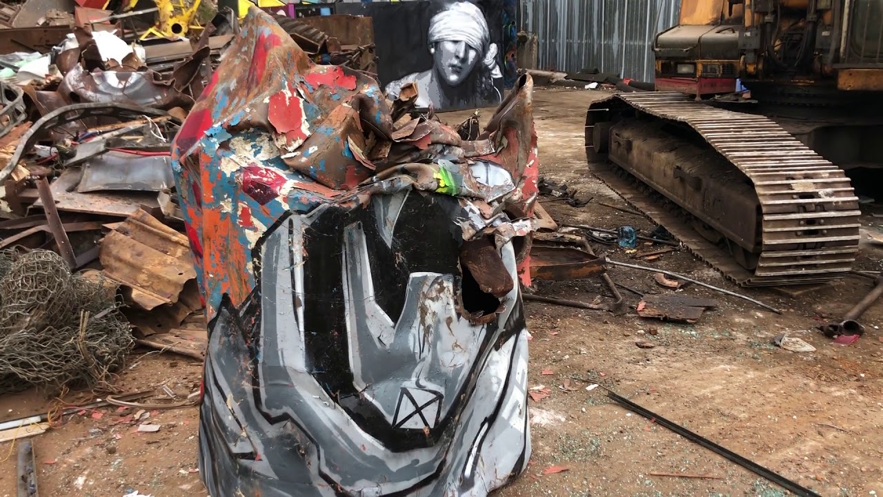 Street Artist Paints Metal Drum And Then Crushes It