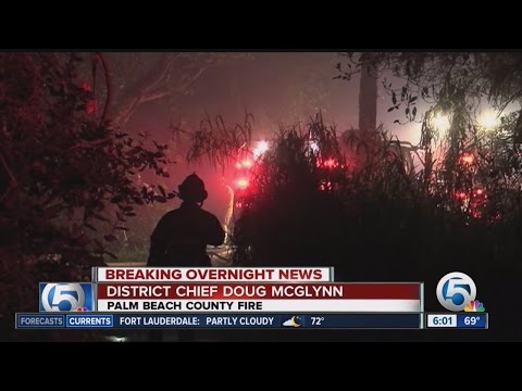Firefighters battle brush
