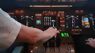 Cockpit view.  BOEING 747-400 Landing.  Close up on pilots actions