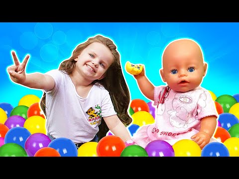 Maya & Baby Born doll at the indoor playground. Family fun. Kids play with toys & ball pit for kids.