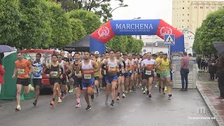 Los marcheneros Said El Bouchikhi y María Álvarez en el pódium de la Carrera Popular de Marchena