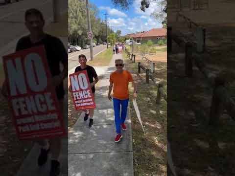 Residents walk in protest to stop security fence around Beverley Park Golf Course