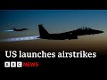 US launches airstrikes on 85 targets in Iraq and Syria | BBC News