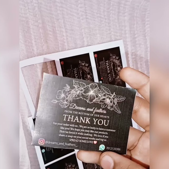A thank you note with a business card enclosed