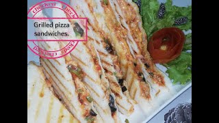 Grilled pizza sandwiches by paitpuja