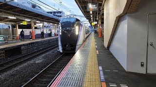 E353系 S102編成 特急かいじ40号新宿行が西八王子駅1番線を低速通過するシーン