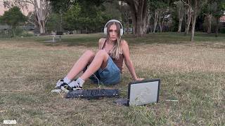 EDM/Hyperpop mix in a park