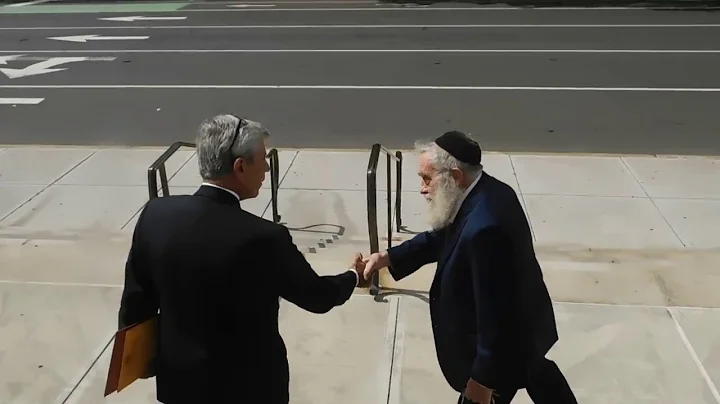 Rabbi Daniel Greer leaves court after his arraignm...