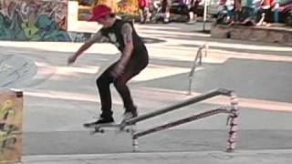 Frontside Feeble Trick tip on a handrail
