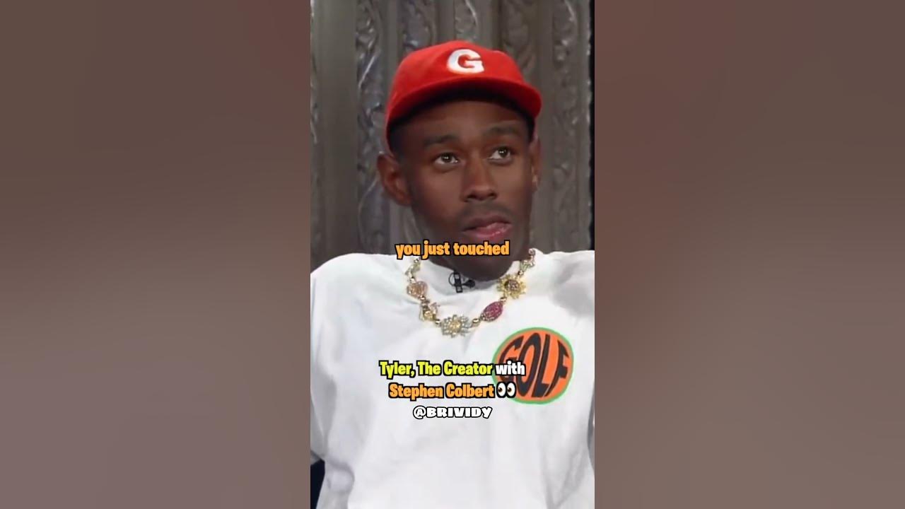 Tyler The Creator touches Stephen Colbert's butt