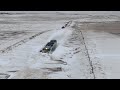 Canadian train plowing a huge snowdrift