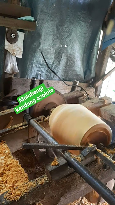 melubangi kendang asolole #woodlate #wood #woodscraft #reels #woodworking #shorts