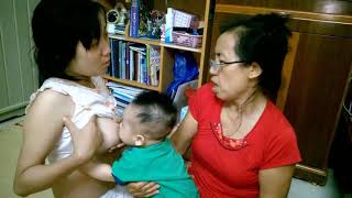 Asian cute mom breastfeeding | ibu muda cantik lagi menyusui