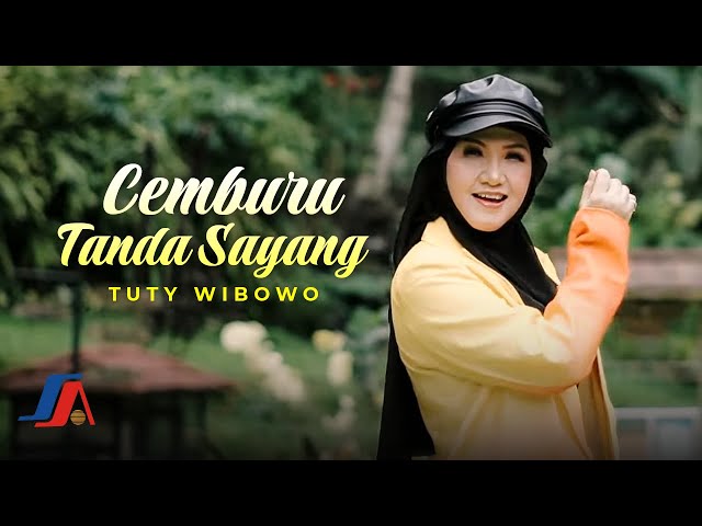 Tuty Wibowo - Cemburu Tanda Sayang (Official Music Video) class=