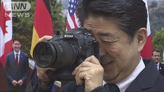 トランプ氏に森友・加計問題・・・報道写真展を総理訪問(17/12/25)