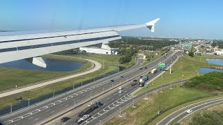 JetBlue Airways Airbus A320-200 landing at Orlando International Airport (MCO)