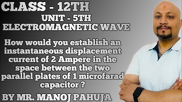 How would you establish an instantaneous displacement current of 2 Ampere in the space between the