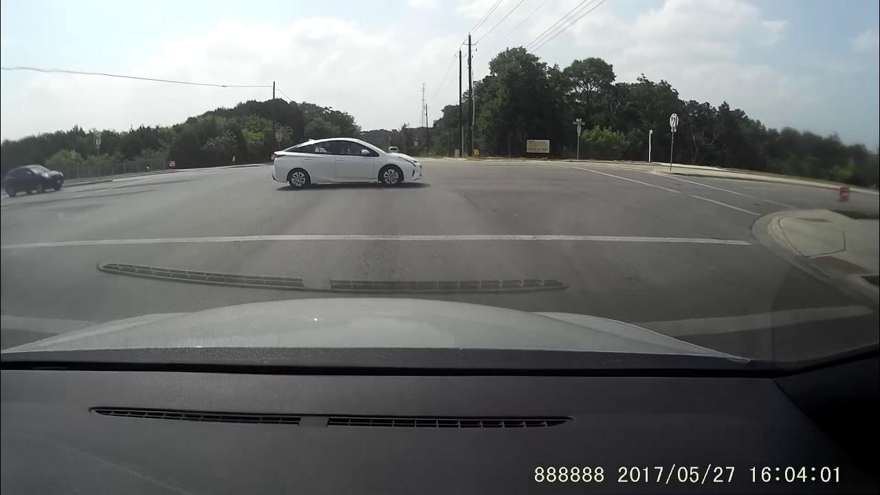 Driver rolls through Stop sign and then honks at me for exercising my