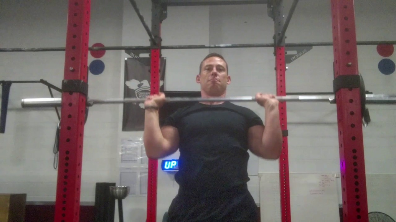 Exercise library - Standing Barbell Shoulder Press - YouTube