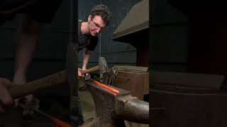 Blacksmith straightens rebar. #blacksmith