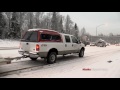 Truck spins tires on Huffman Road