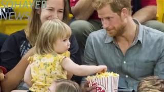 Sneaky toddler steals prince harry's popcorn