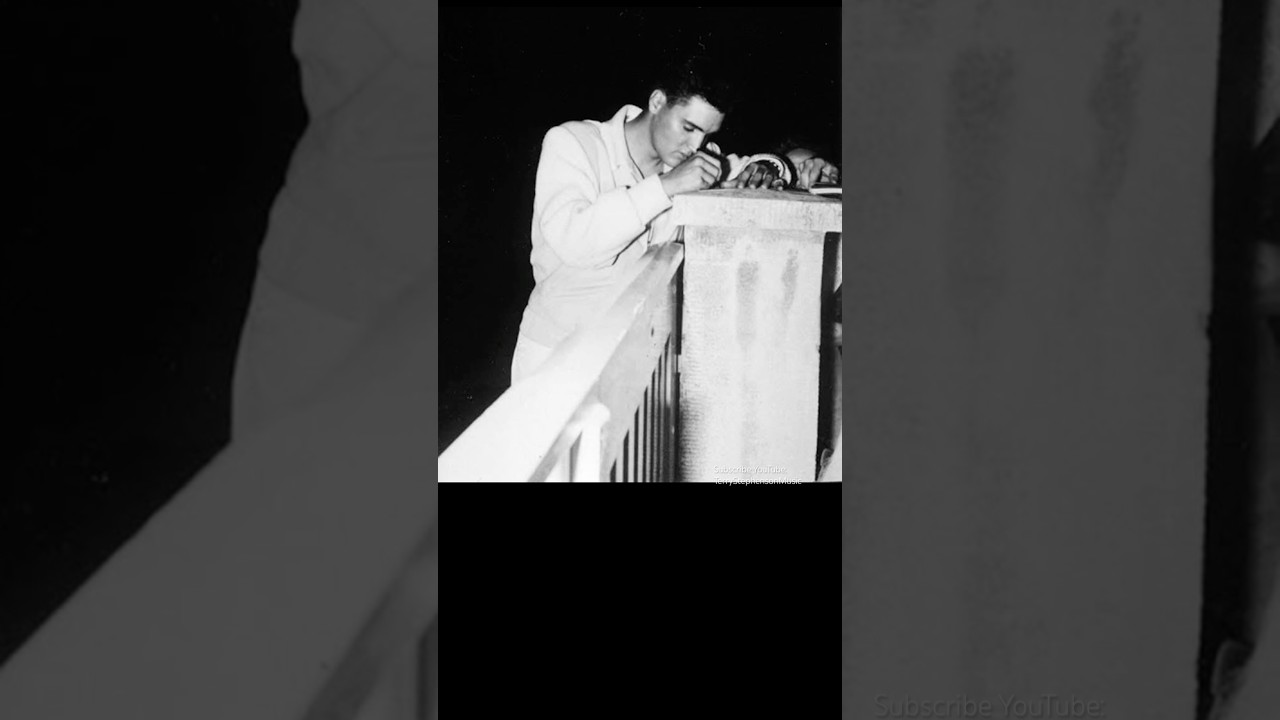 Elvis signing autographs.Outside his rented home in Bad Nauheim, Germany. August 1959.
