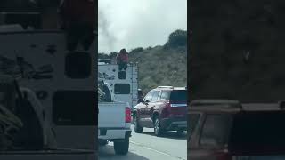Man on a RV trailer traveling southbound I-15