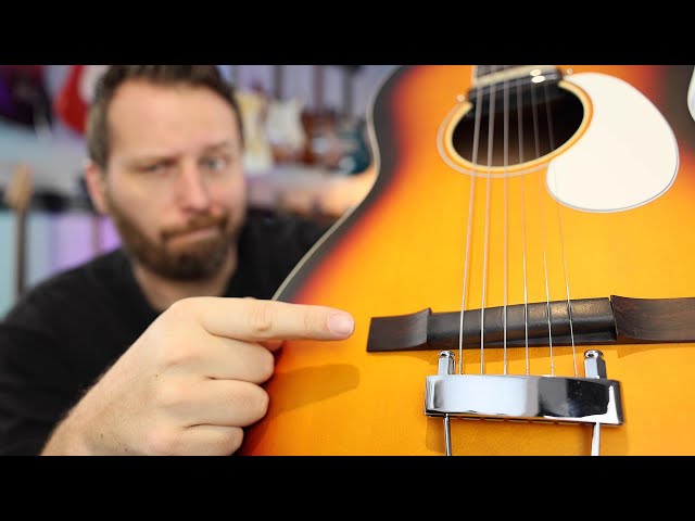 Unveiling the Secrets of the Acoustic Guitar Tailpiece: A Journey of Tone and Playability Master the Art of Playing Guitar and Play Like a Pro Unveiling the Secrets of the Acoustic Guitar Tailpiece: A Journey of Tone and Playability - Master the Art of Playing Guitar and Play Like a Pro
