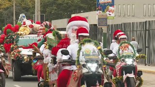 Peru's National Police drive the streets of Lima in costume for Christmas Eve parade