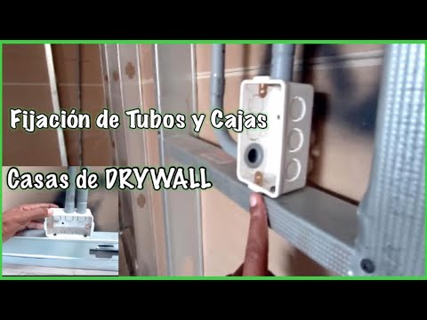 Video: Instalación de un tomacorriente en paneles de yeso: instrucciones. Instalación de cajas de enchufes