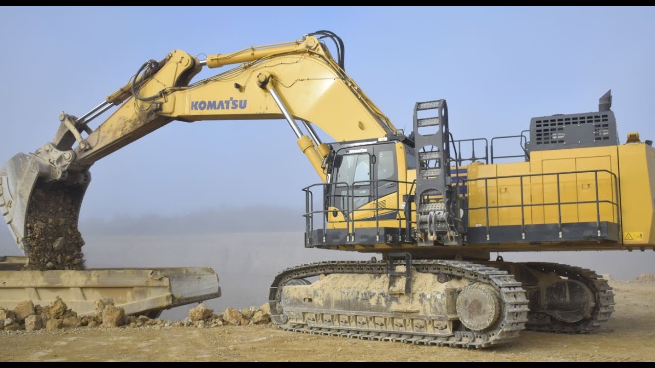 Komatsu PC1250 loading Cat 771D - SNCC Carrière de Coussegrey