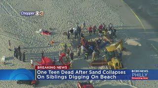 Teen Dies After Sand Collapses On Siblings Digging On NJ Beach
