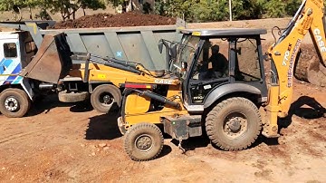 JCB Backhoe Machine Loading Stone in Tractor - JCB earthmoving Big machine work JCB Machine Video