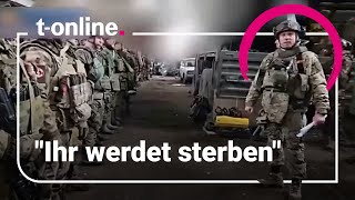 Russischer Kommandeur zu Soldaten: 